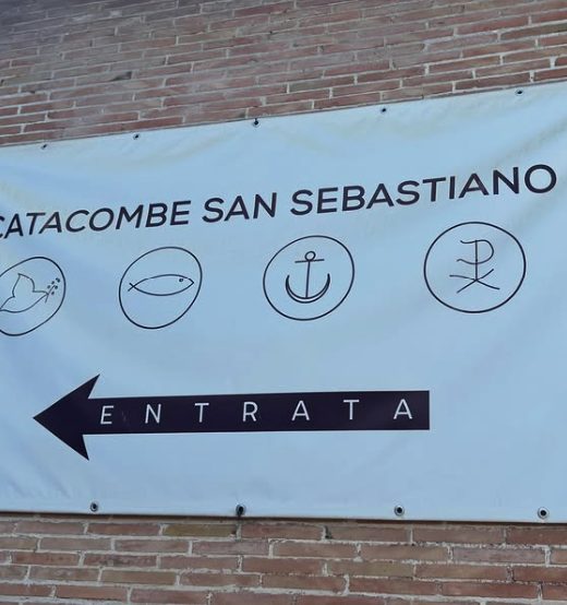 Signage at the Catacombs of San Sebastiano naming the site on the Appian Way